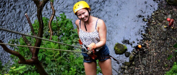 arenal zip lining tour rappelling down the river